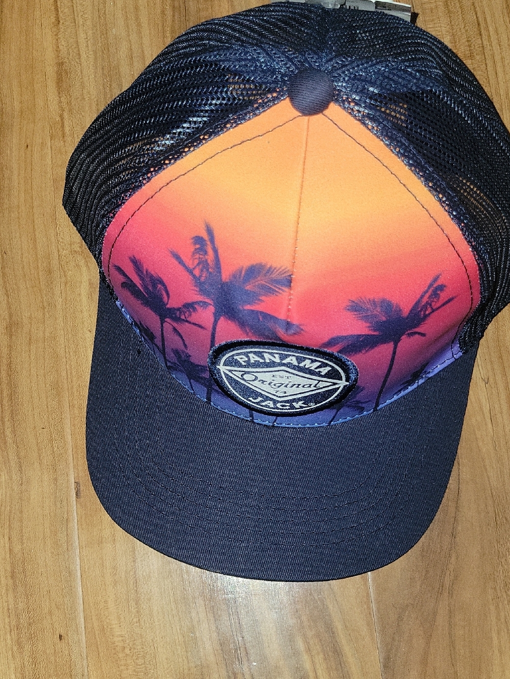 Panama Jack Black Trucker Hat with Orange Gradient Front